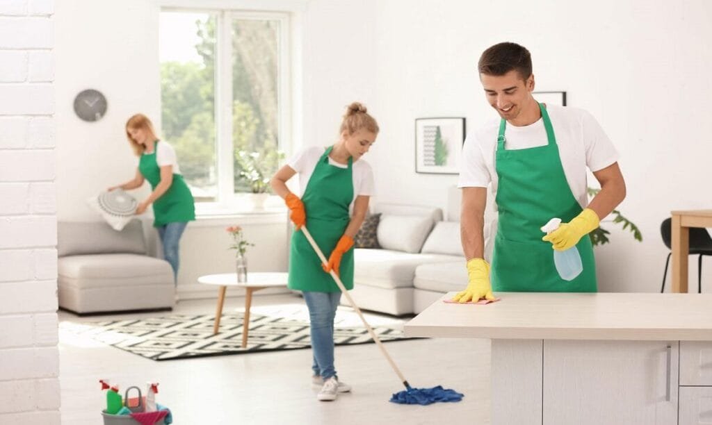 Comprehensive Deep Cleaning Portsmouth - OnCleaning Team Cleaning Living Areas Portsmouth deep cleaning service team - OnCleaning professionals cleaning living room and kitchen areas
