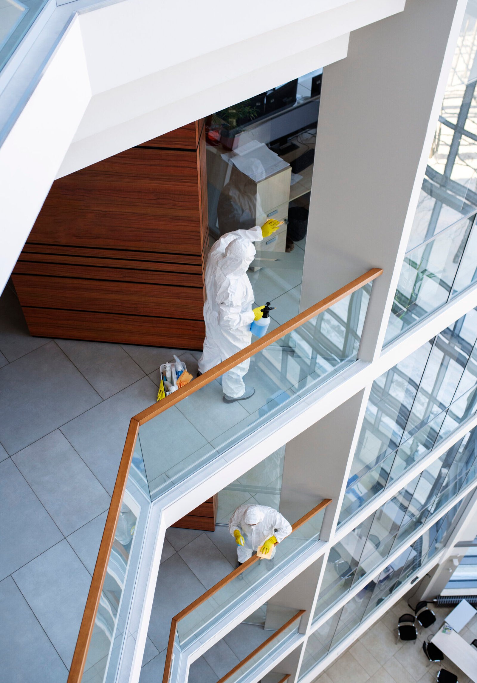 full-shot-people-wearing-hazmat-suits