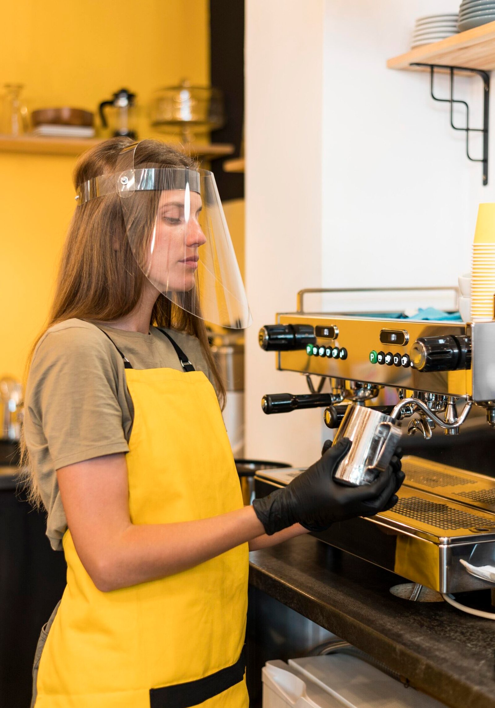 side-view-barista-with-face-protection-gloves
